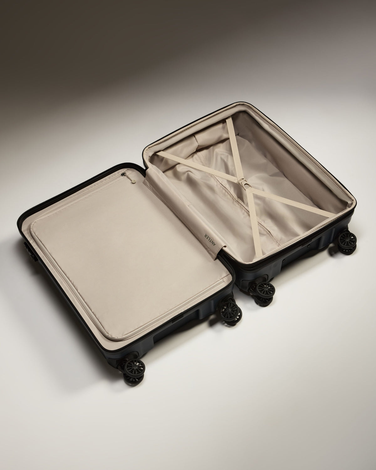 a suitcase with wheels and a lid
