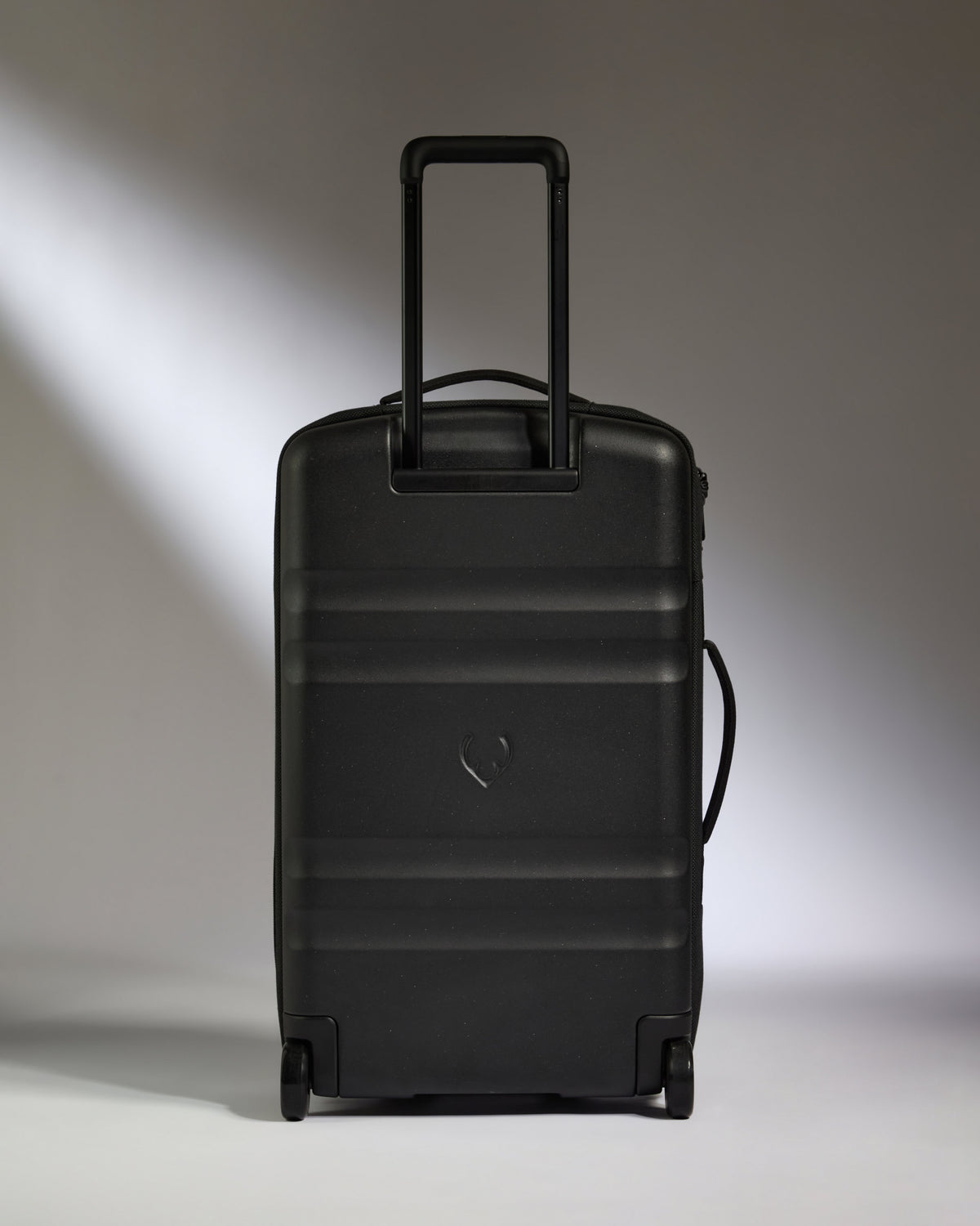 a black suitcase with handle
