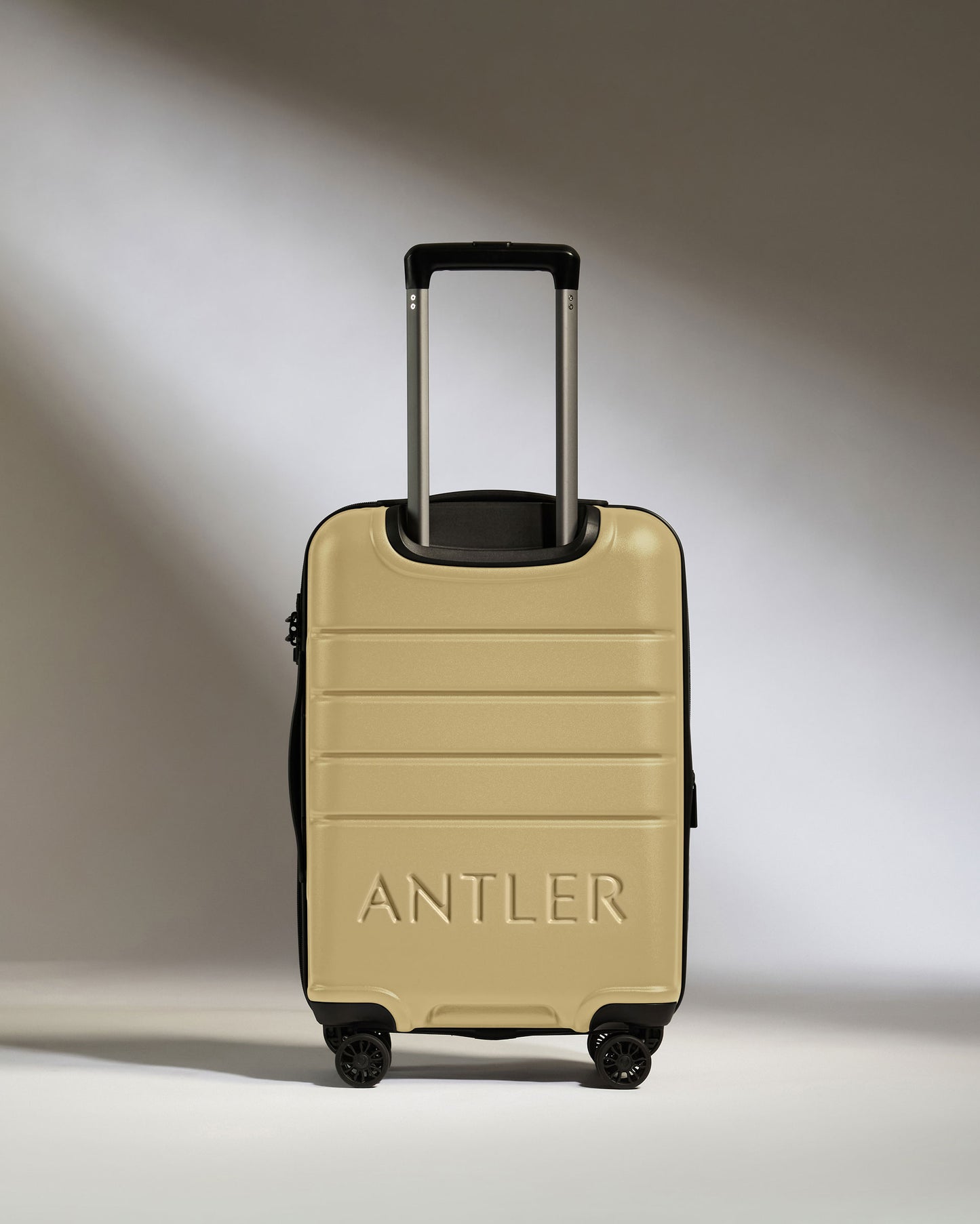 Expandable Cabin Suitcase in Dark Sand - Logo