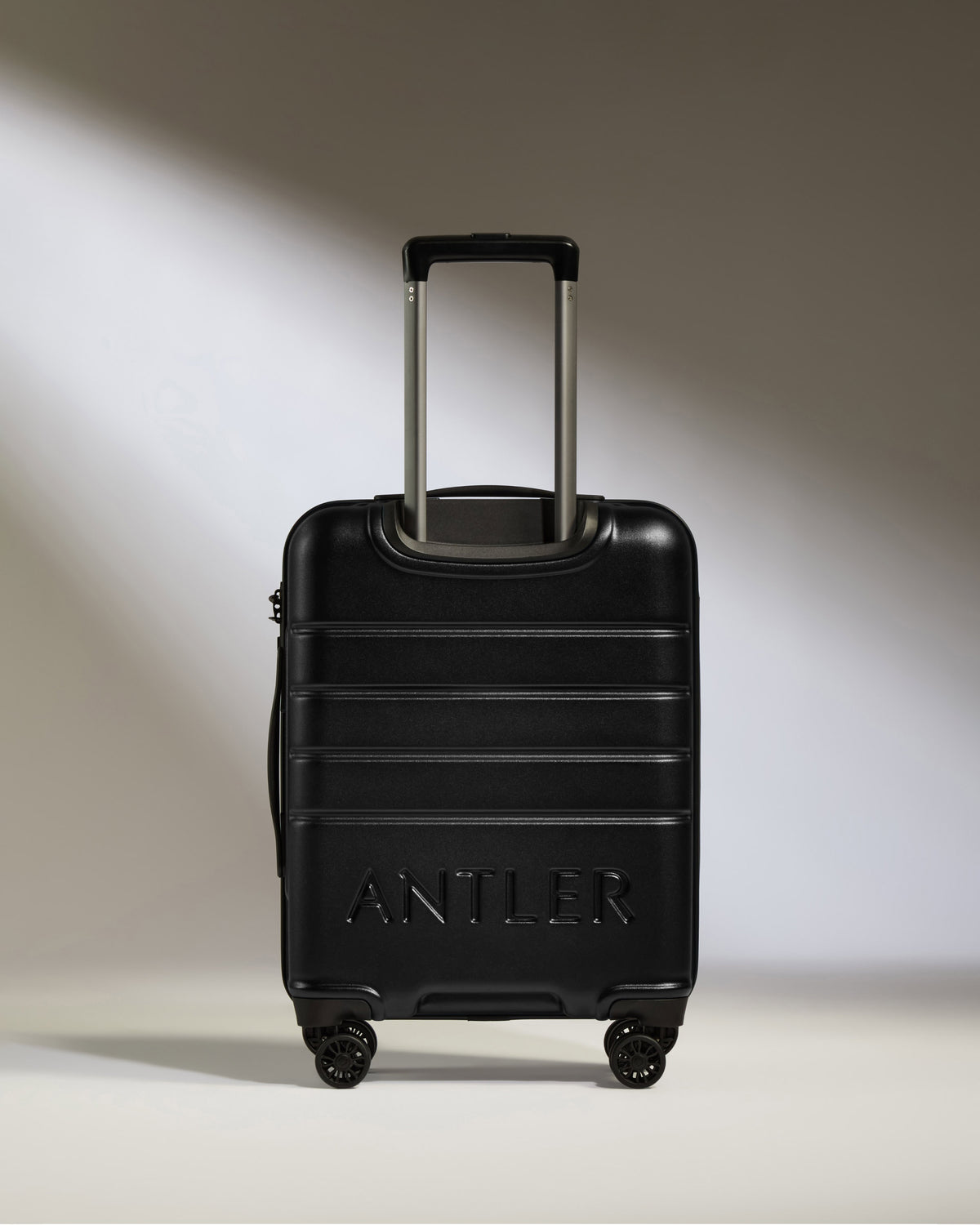Cabin Suitcase in Black - Logo