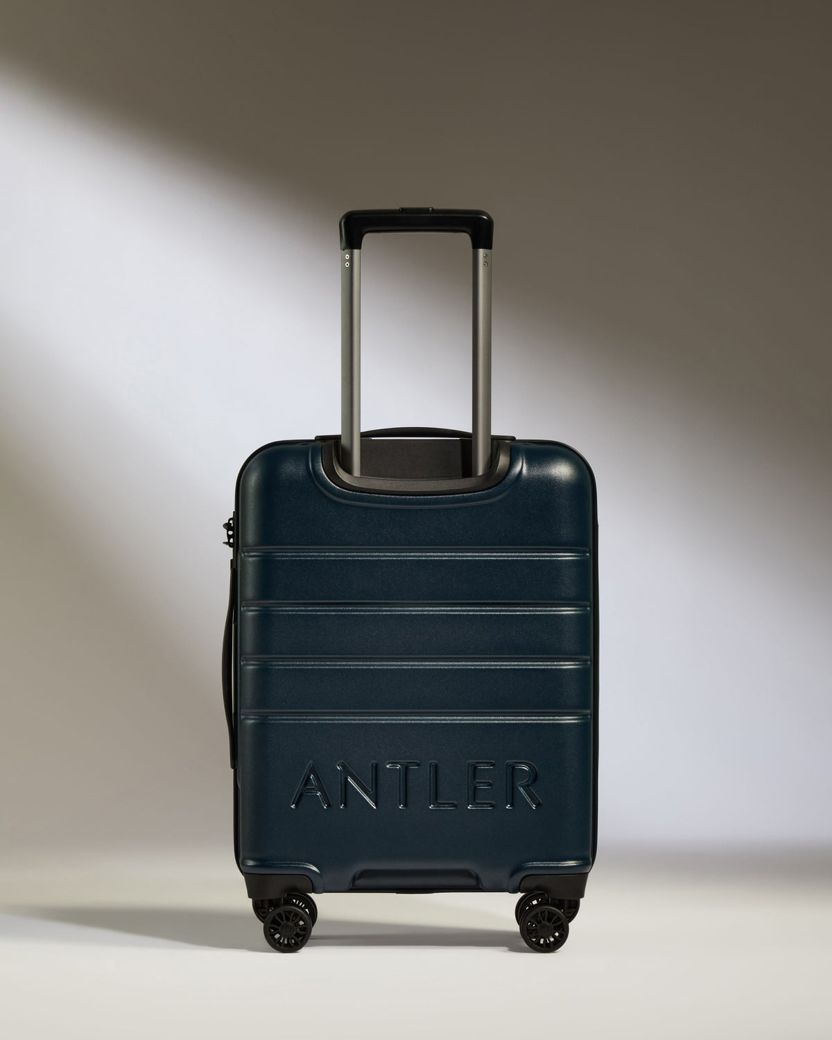 a blue suitcase with handle