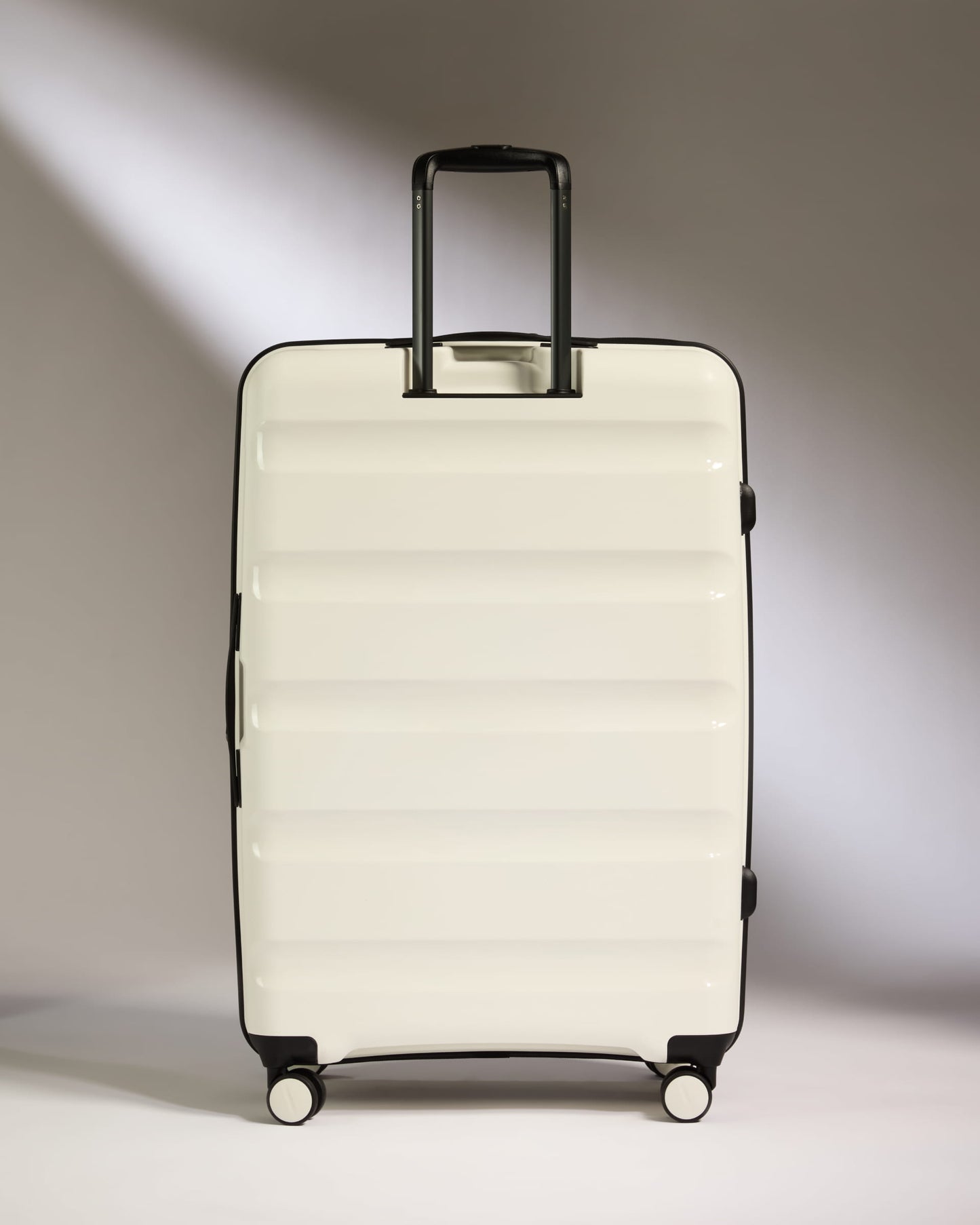 Large Suitcase in White - Logo Stripe
