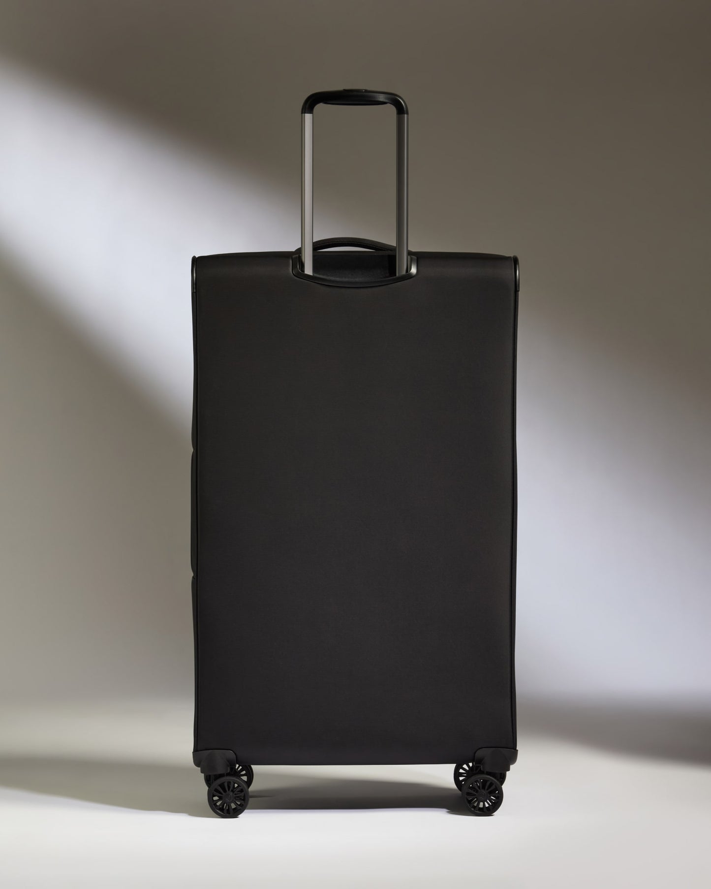 Lightest Large Suitcase in Black - Soft Stripe 2.0