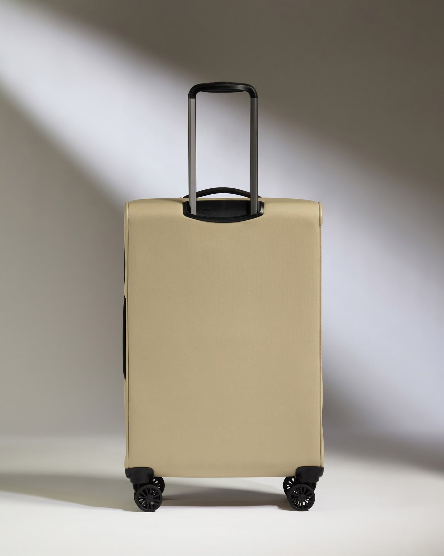 Lightest Medium Suitcase in Sand - Soft Stripe 2.0