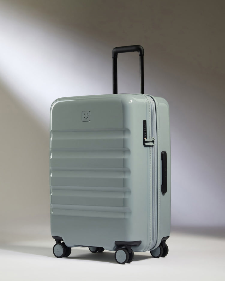 Medium Suitcase in Mist Blue Gloss - Icon Stripe