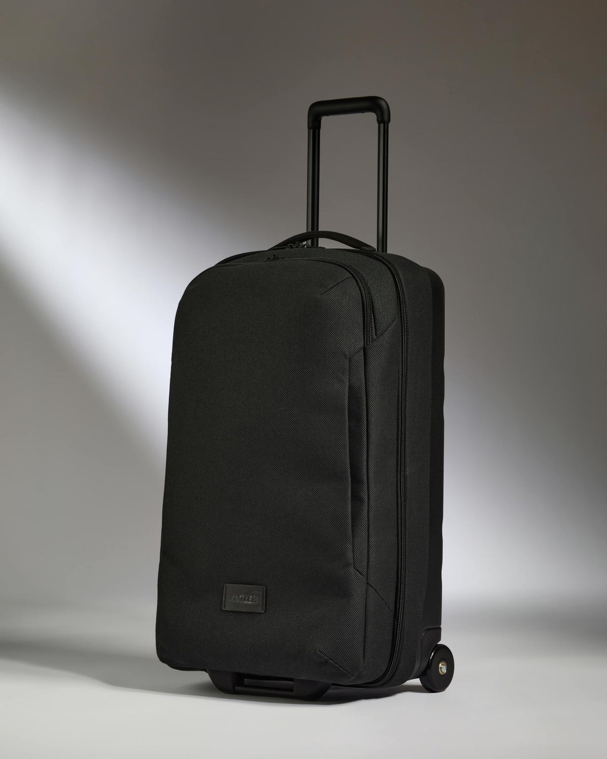 a black suitcase with wheels
