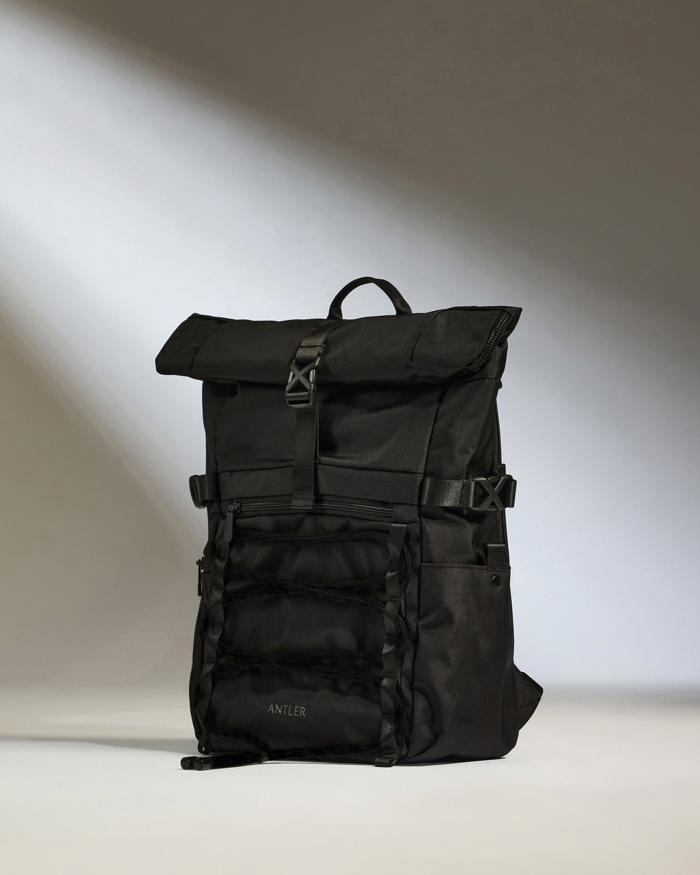 Discovery Roll Top Backpack in Black