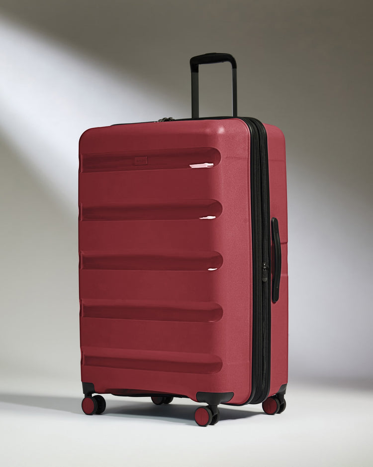 Large Suitcase in Soft Red - Logo Stripe