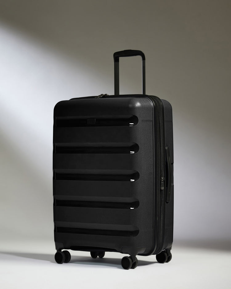 Medium Suitcase in Black - Logo Stripe