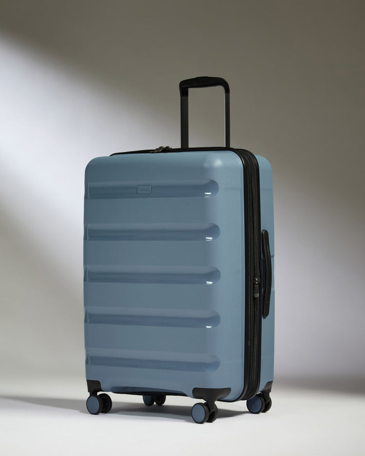 Medium Suitcase in Light Blue - Logo Stripe