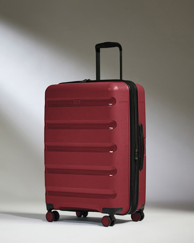 Medium Suitcase in Soft Red - Logo Stripe
