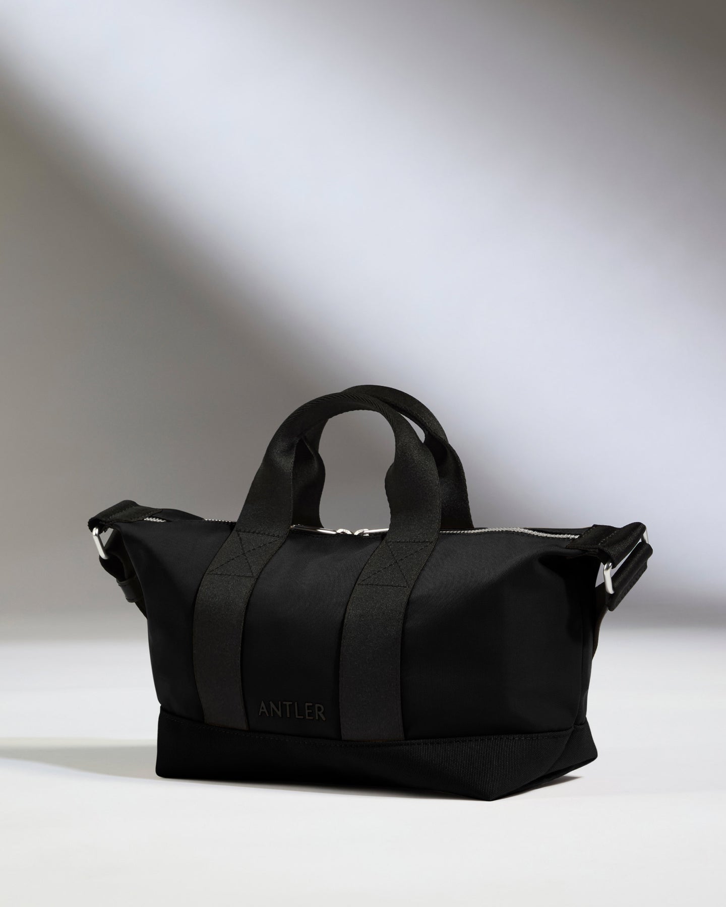 Icon Mini Crossbody Bag in Black