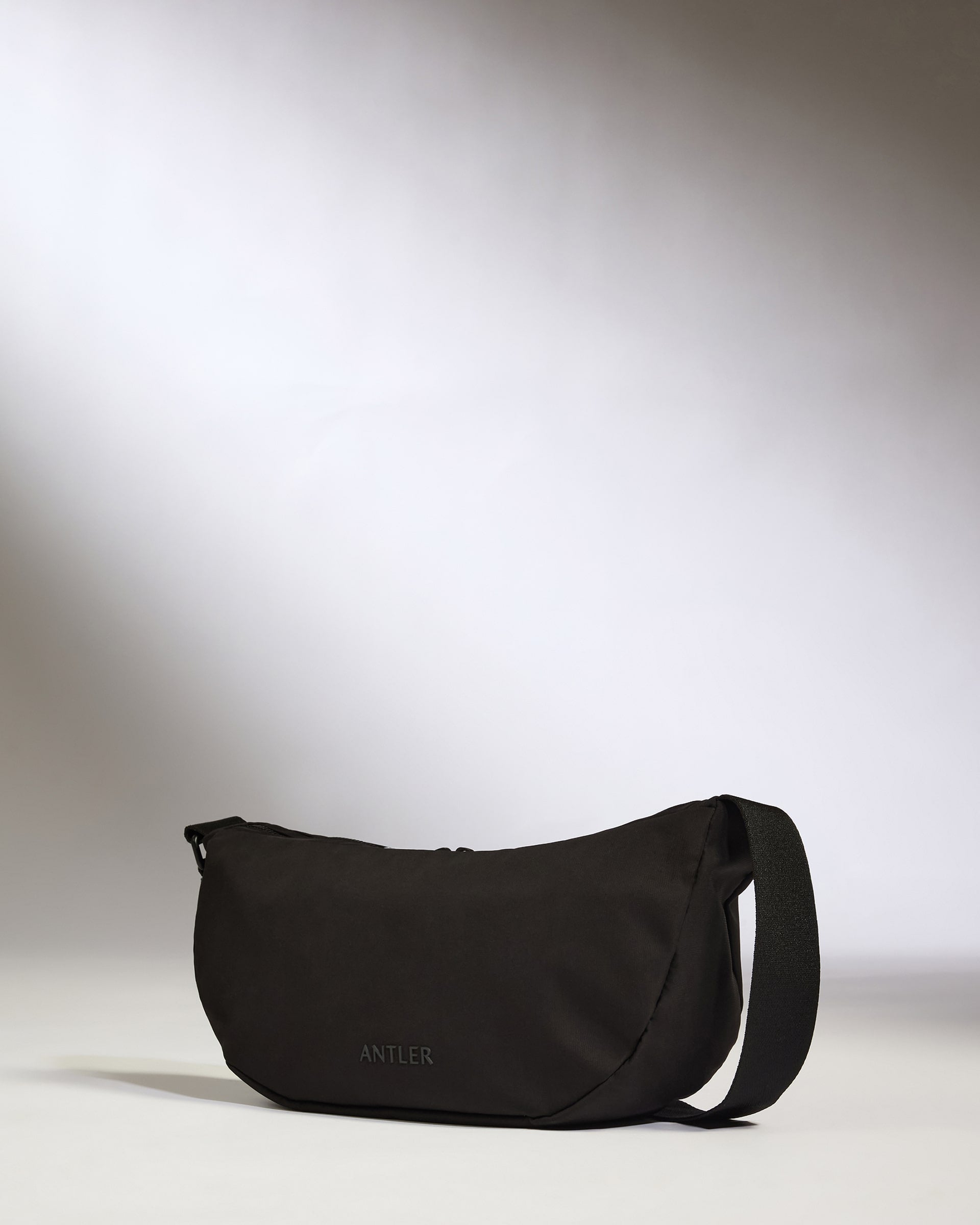 Icon Slingbag in Black | Crossbody Travel Bag & Accessories