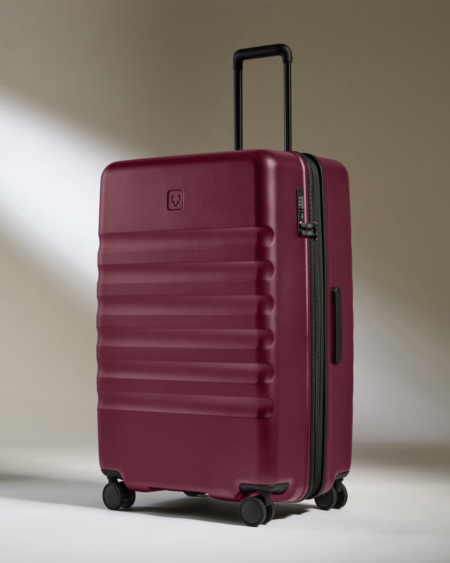 Large Suitcase in Heather Purple - Icon Stripe