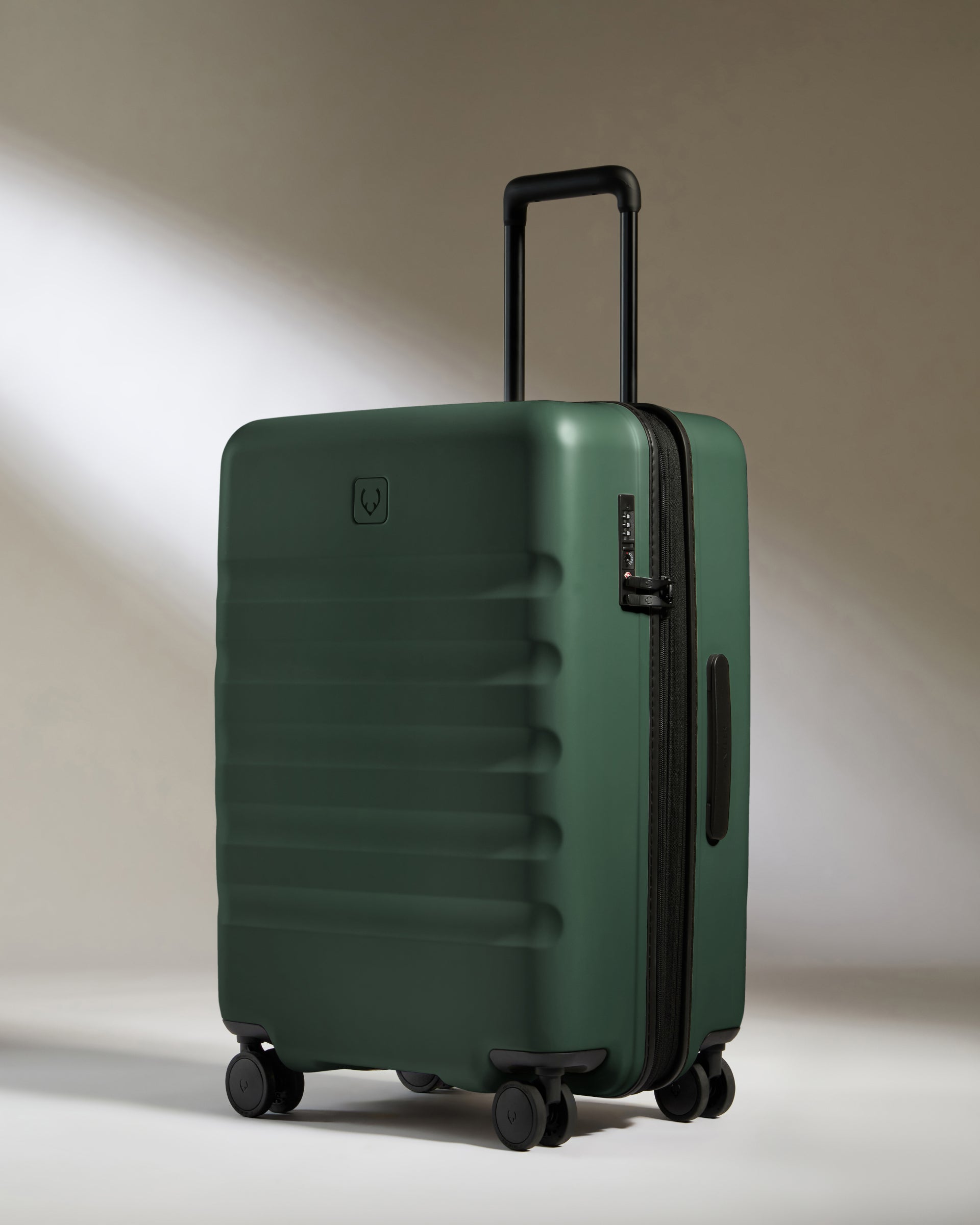 Medium Suitcase in Antler Green Icon Stripe