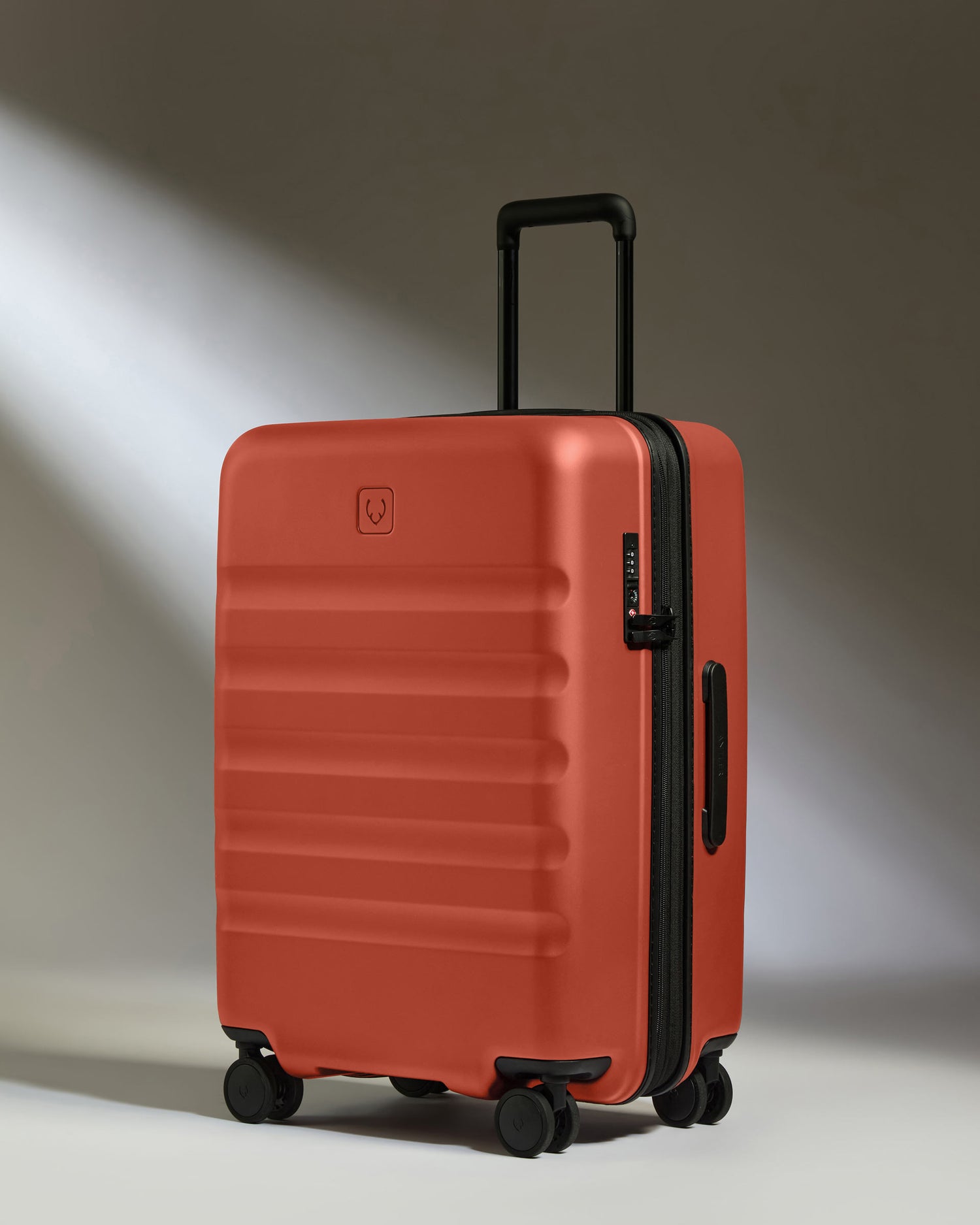 Medium Suitcase in Buckthorn Red - Icon Stripe