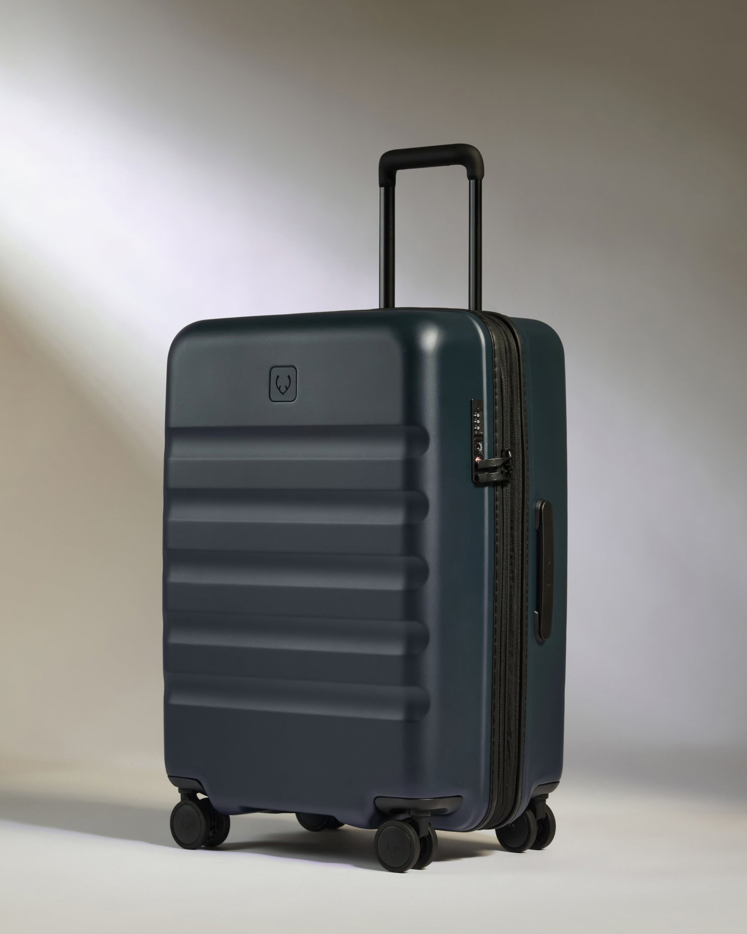 Medium Suitcase in Indigo Blue - Icon Stripe