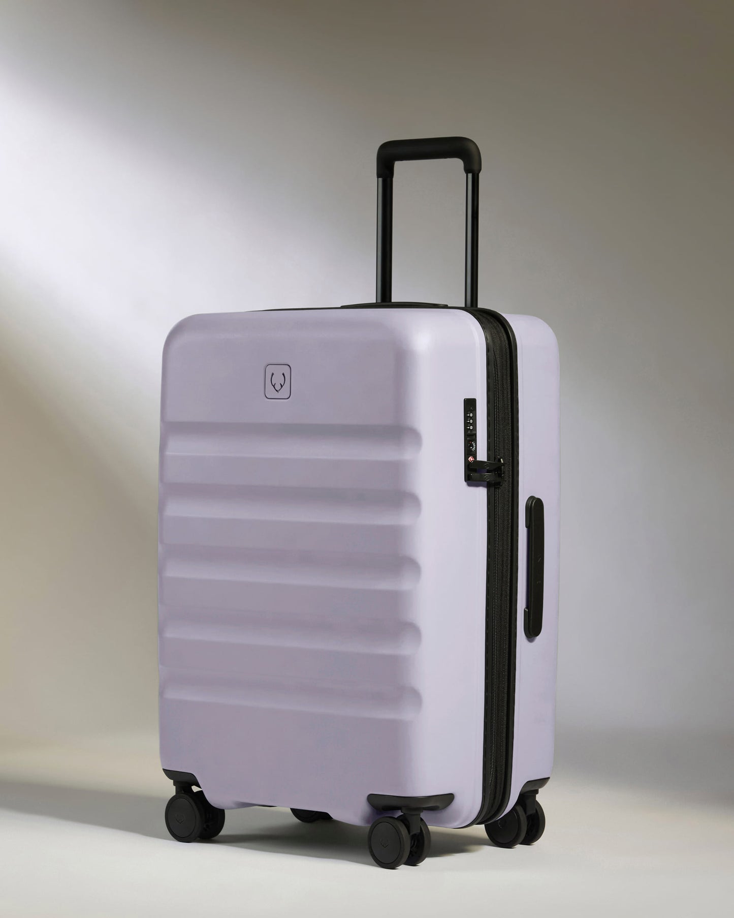 Medium Suitcase in Meadow Purple - Icon Stripe
