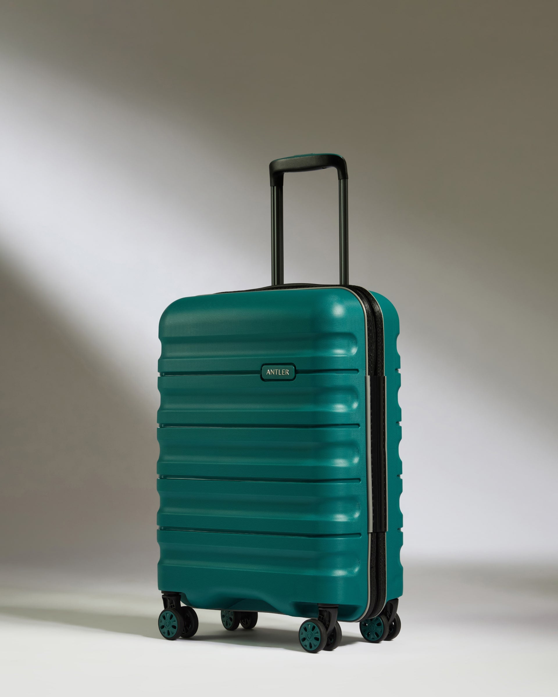 Teal suitcase on sale