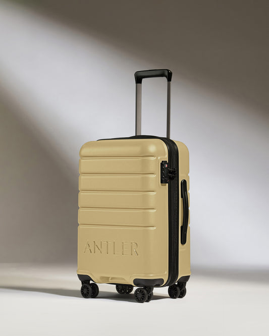 Expandable Cabin Suitcase in Dark Sand - Logo