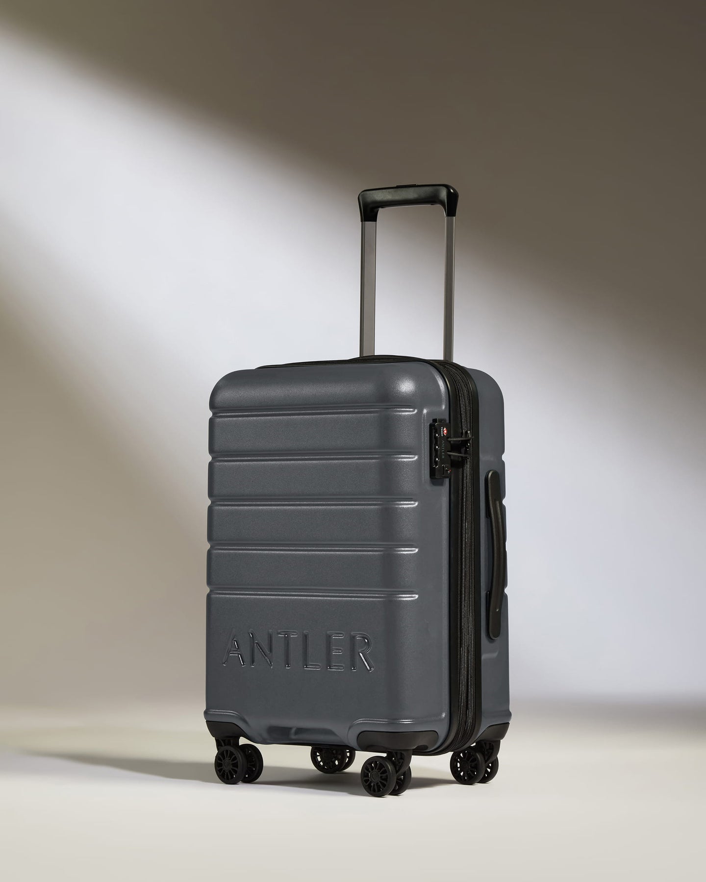 Expandable Cabin Suitcase in Granite - Logo