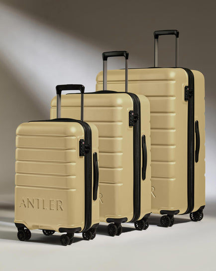Expandable Suitcase Set in Dark Sand - Logo