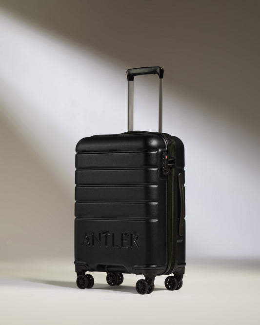 Cabin Suitcase in Black - Logo
