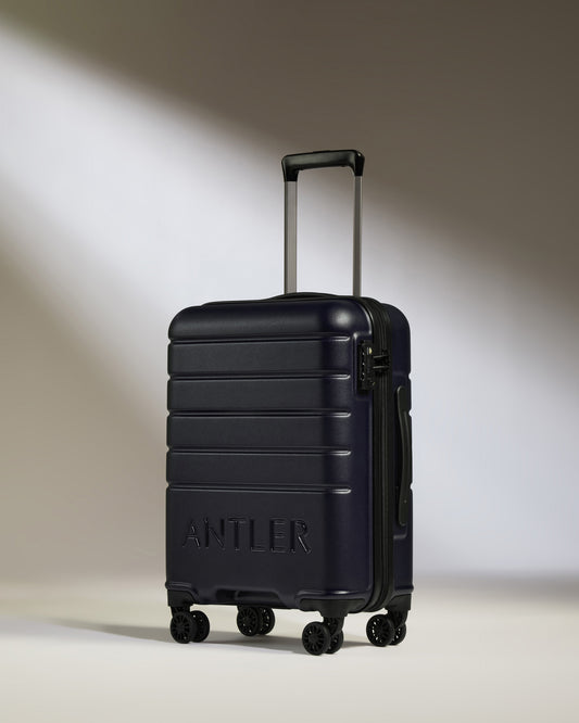 Cabin Suitcase in Dark Purple - Logo
