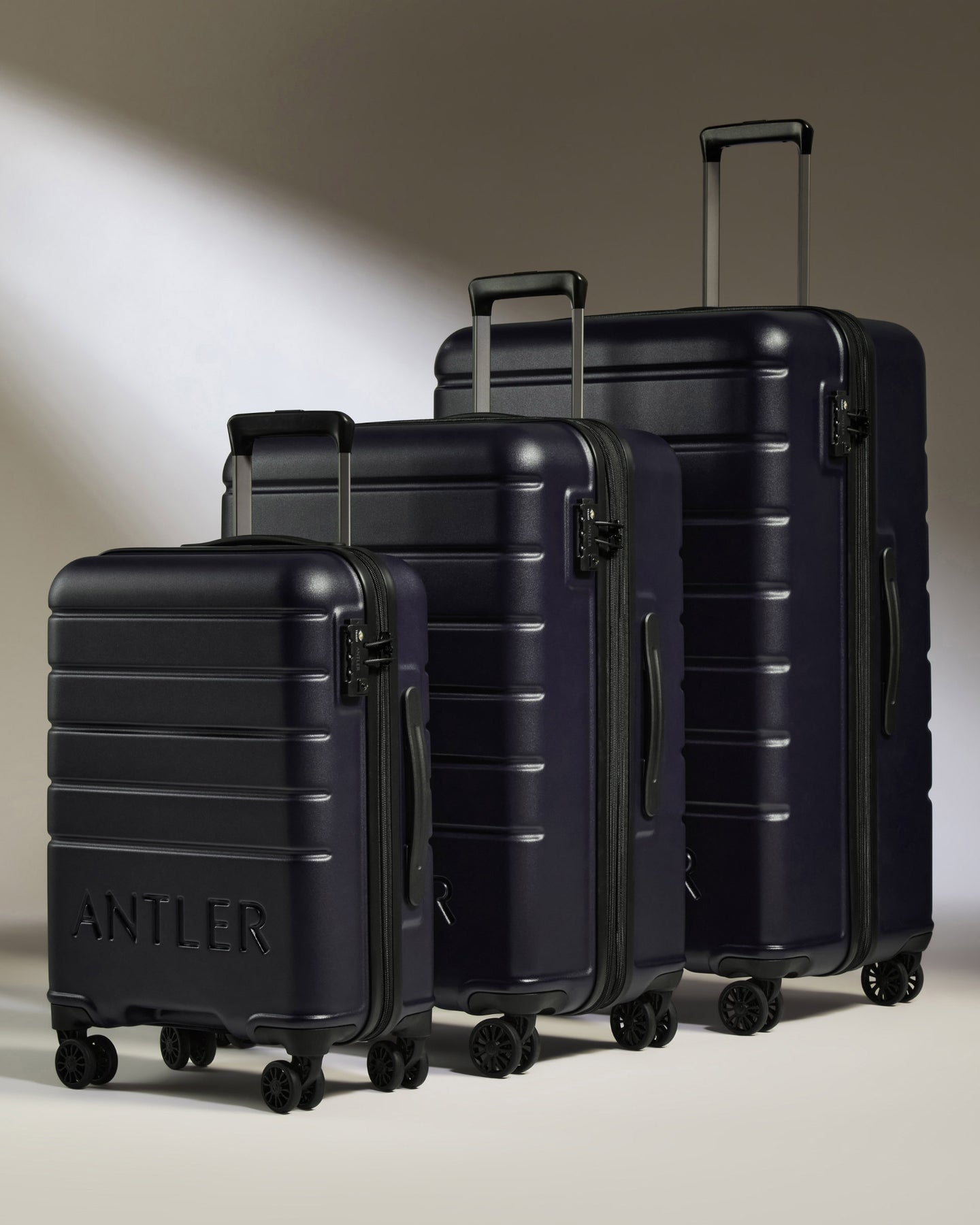 Suitcase Set in Dark Purple - Logo