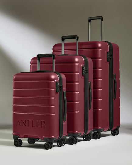 a group of luggage on wheels