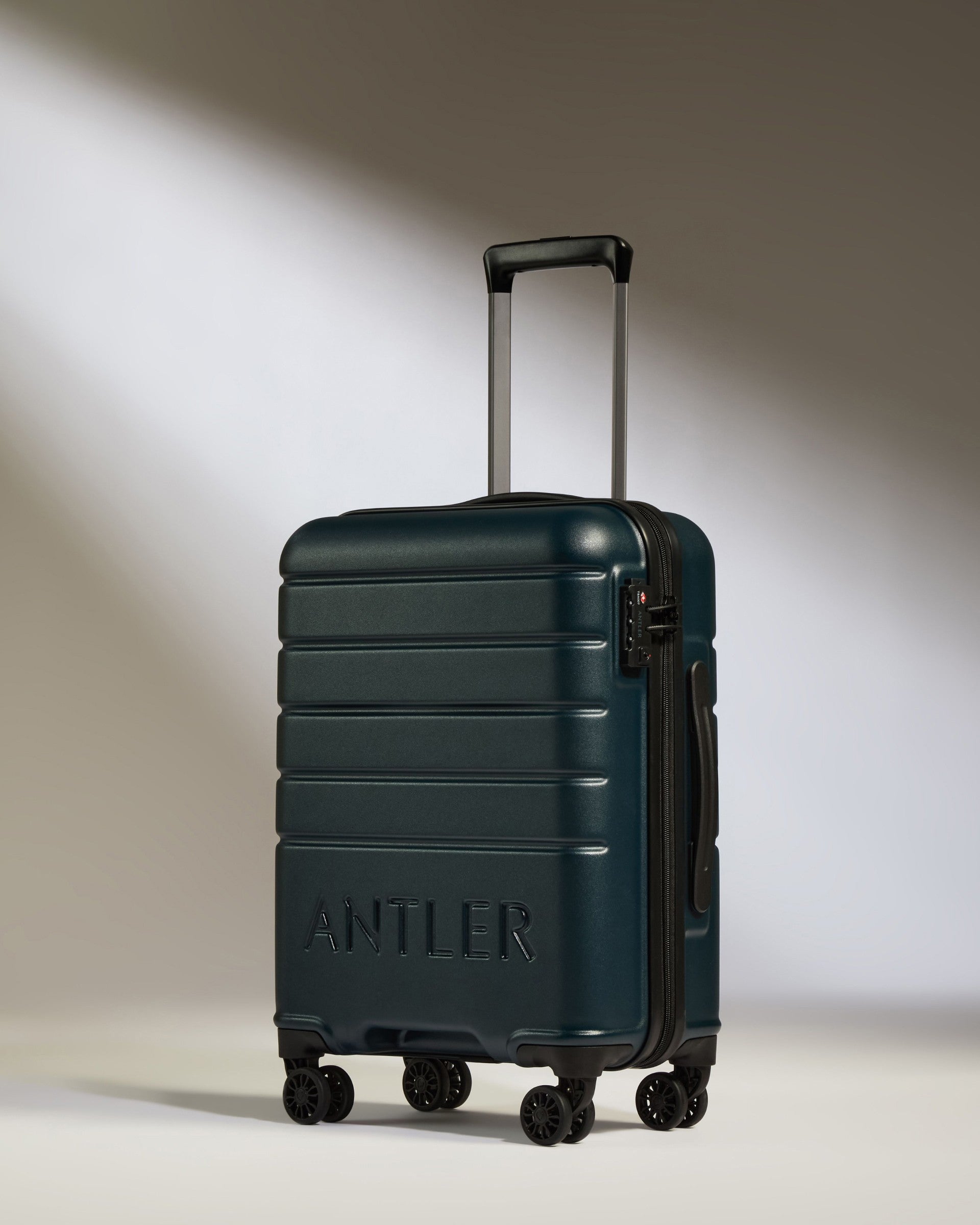 a blue suitcase with wheels