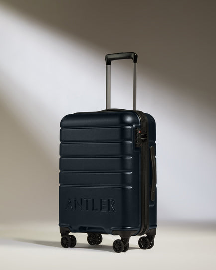 Cabin Suitcase in Dark Navy - Logo