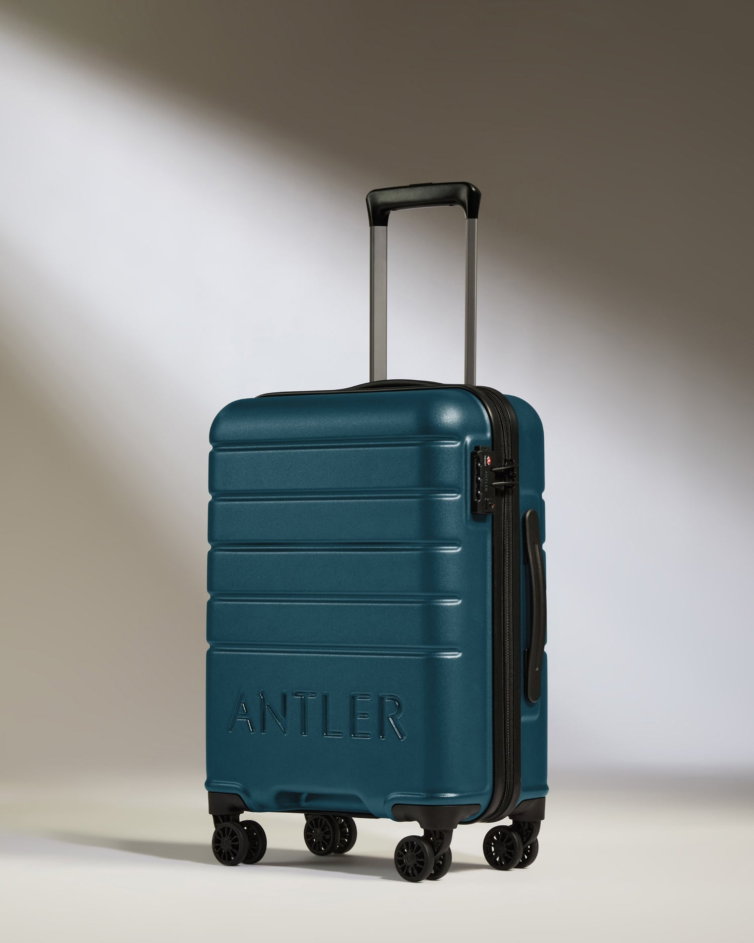 Cabin Suitcase in Soft Blue - Logo