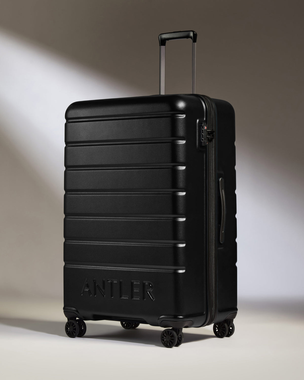 a black suitcase with wheels