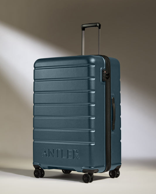 Large Suitcase in Blue Grey - Logo