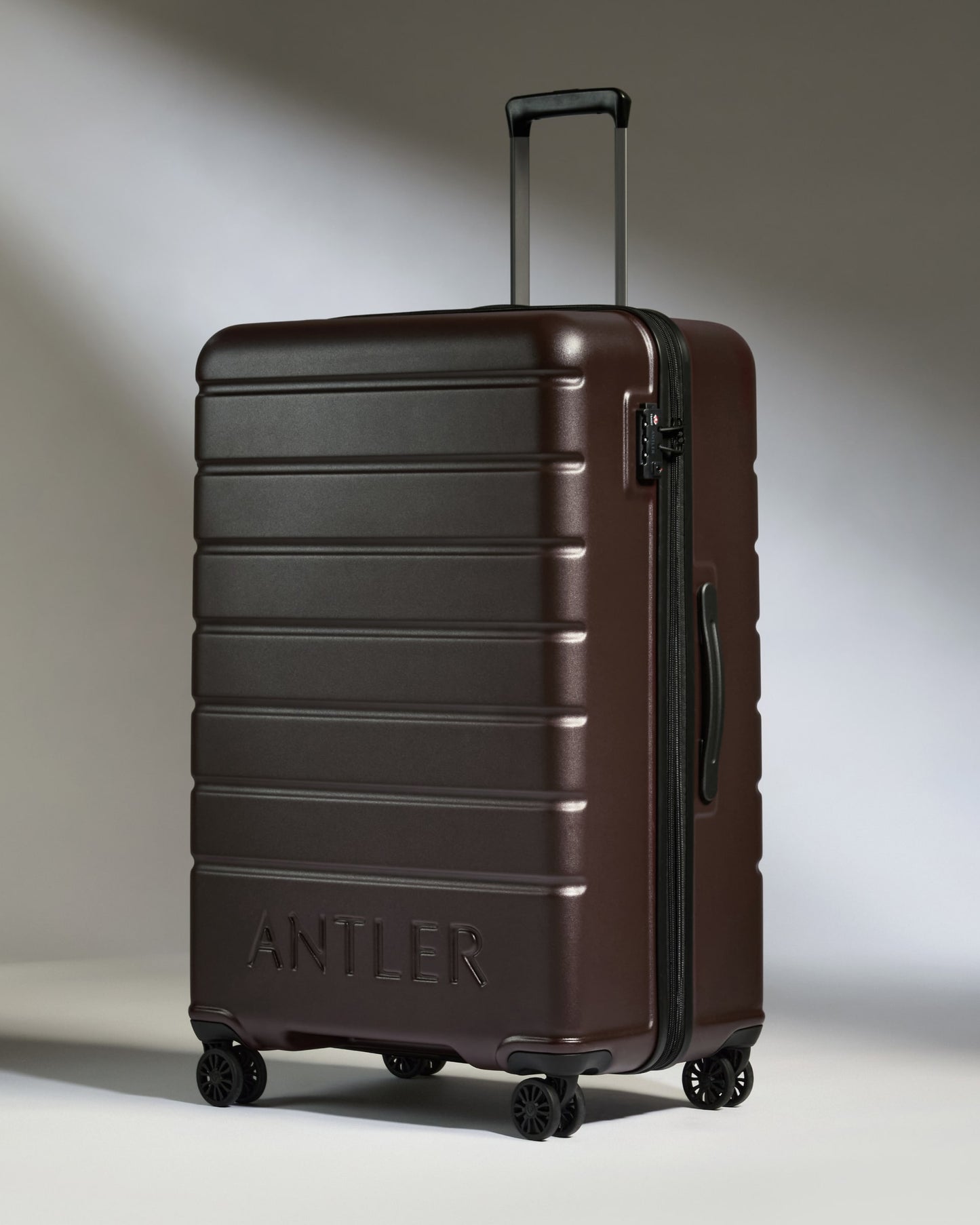 Large Suitcase in Cedar Brown - Logo