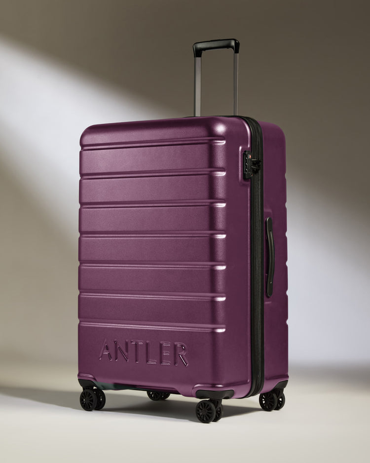 Large Suitcase in Dark Heather Purple - Logo