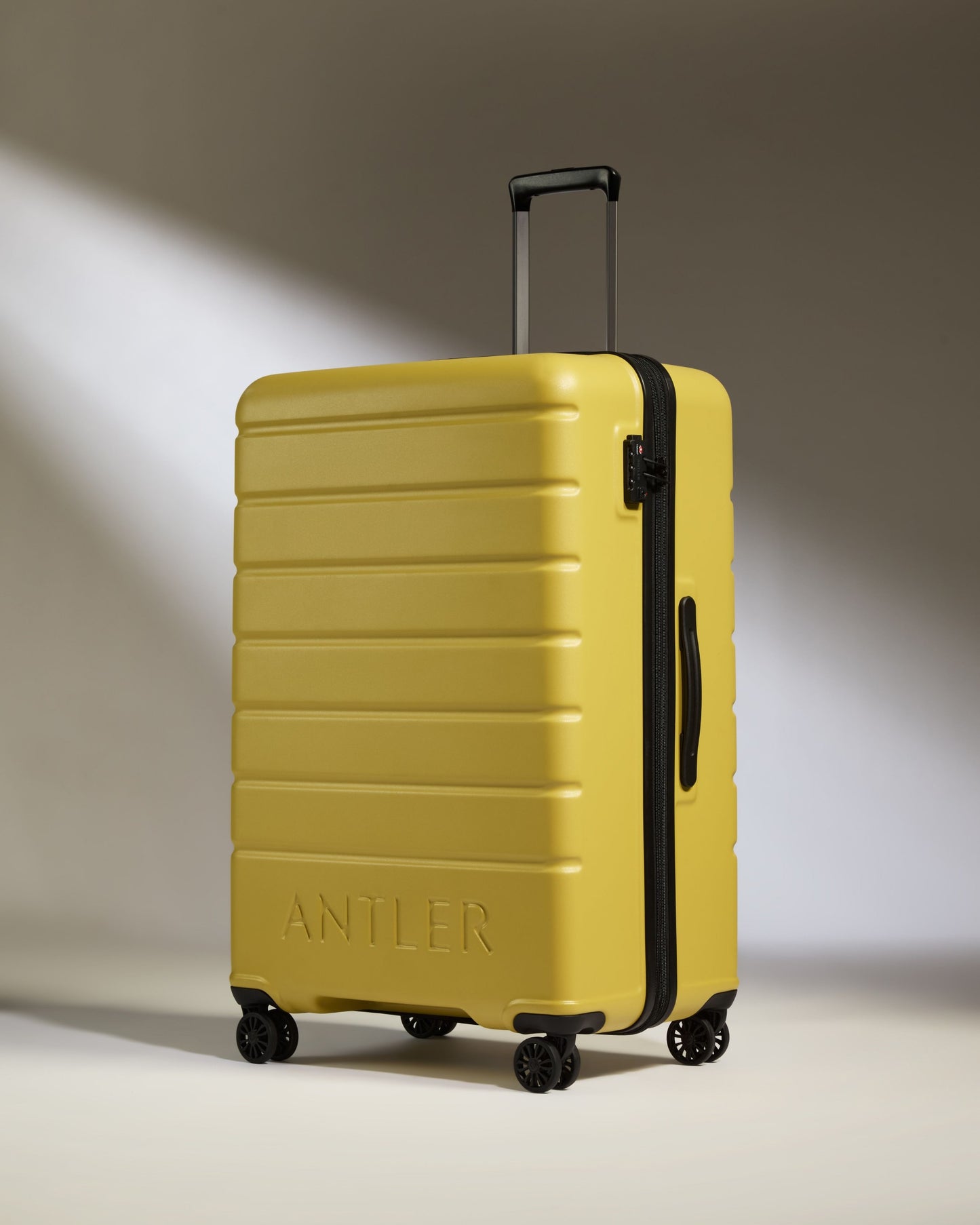 Large Suitcase in Mustard Yellow - Logo