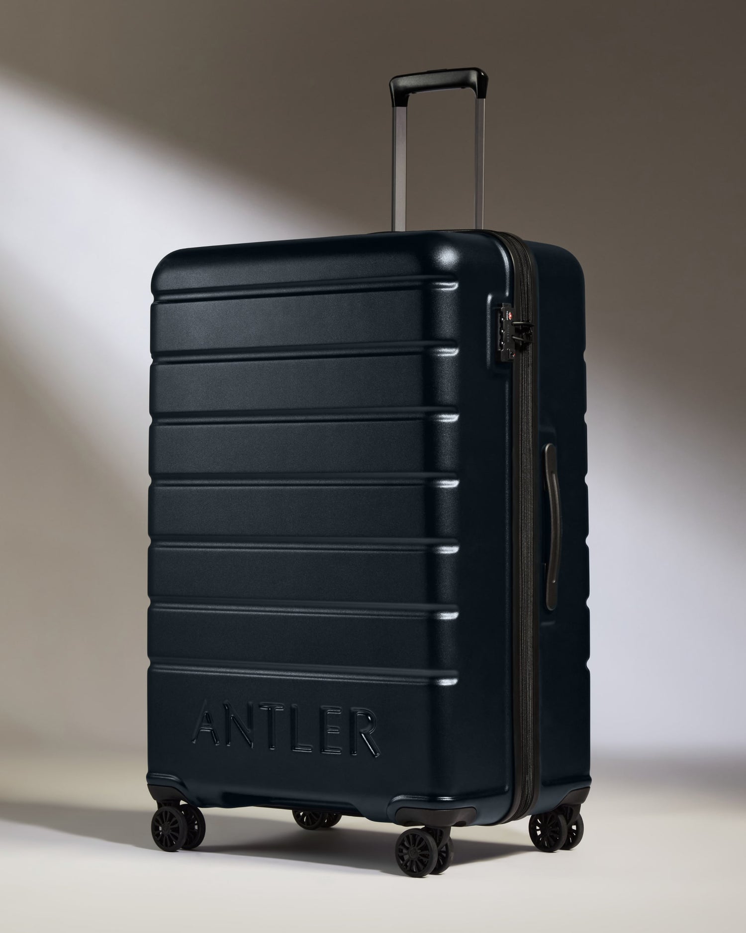 Large Suitcase in Dark Navy - Logo