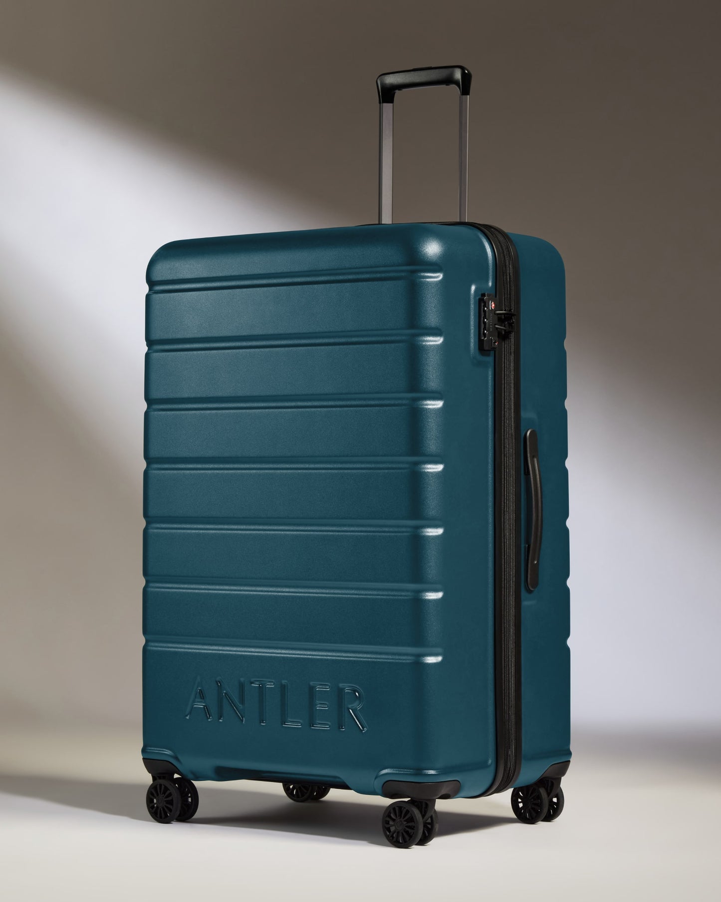 Large Suitcase in Soft Blue - Logo