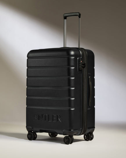 a black suitcase with wheels