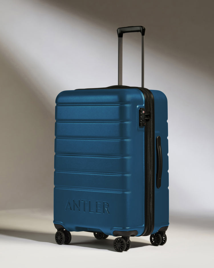Medium Suitcase in Bold Blue - Logo