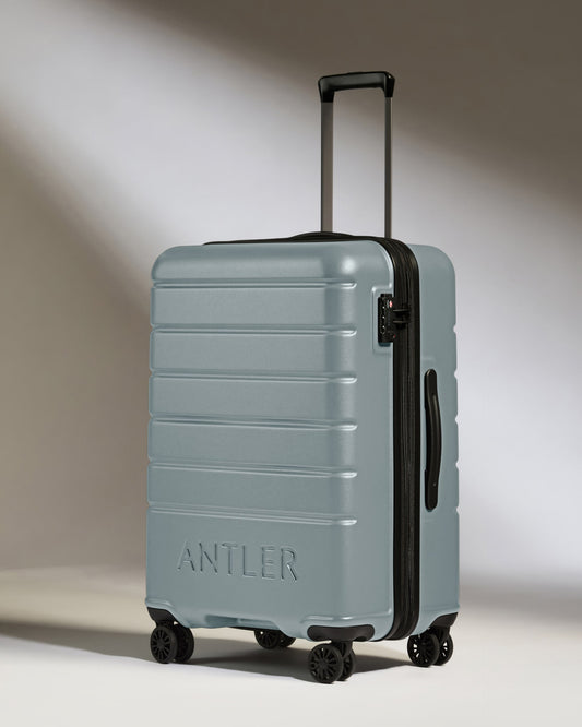 Medium Suitcase in Cool Grey - Logo