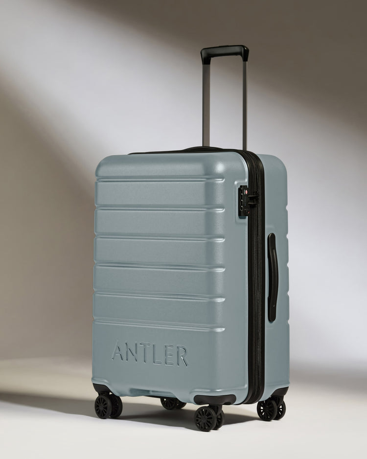 Medium Suitcase in Cool Grey - Logo