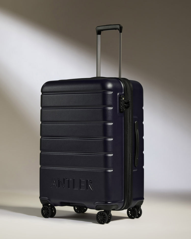 Medium Suitcase in Dark Purple - Logo