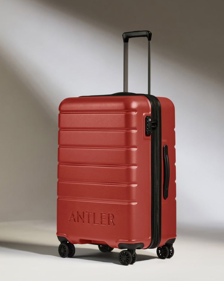 Medium Suitcase in Red Orange - Logo