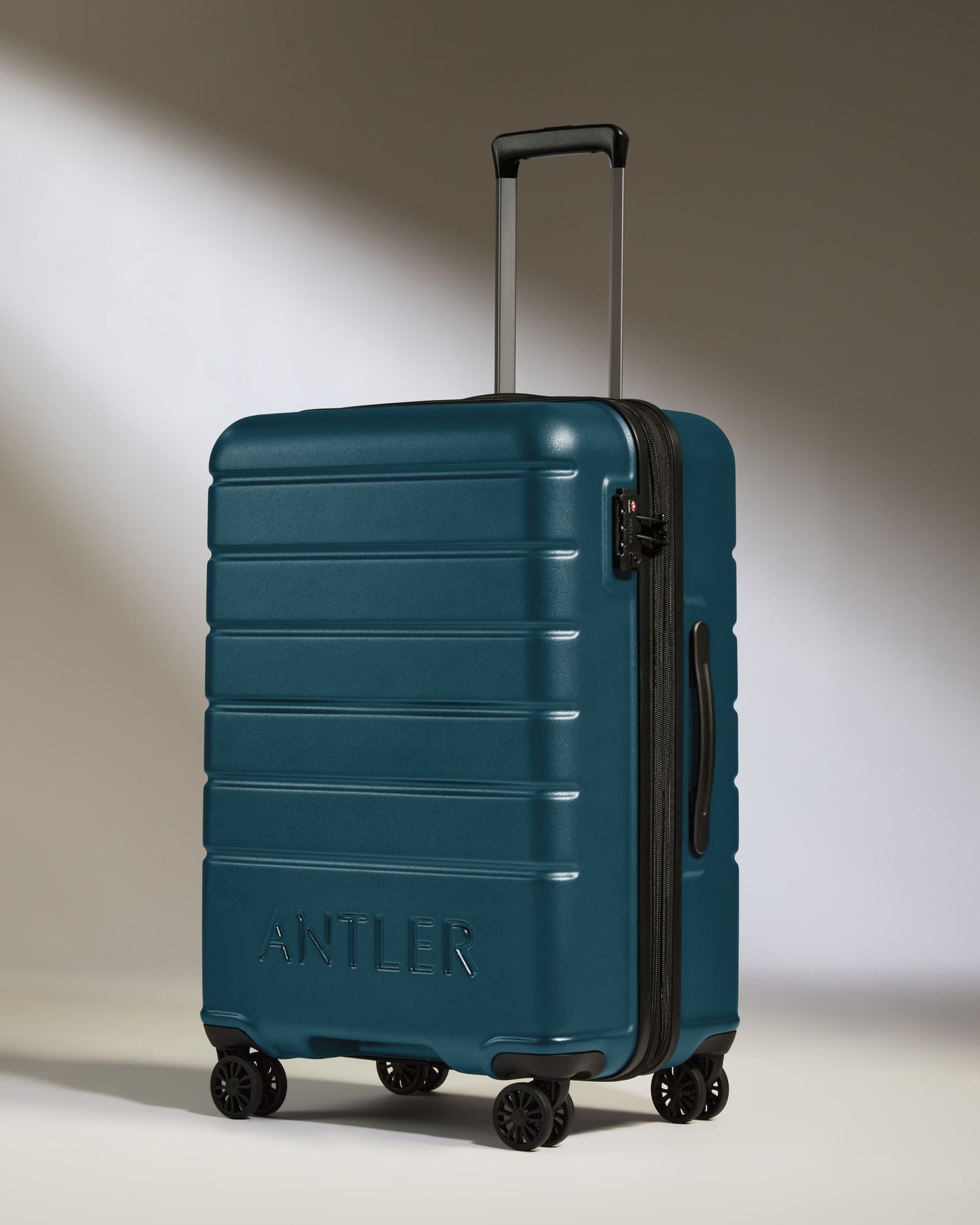 Medium Suitcase in Soft Blue - Logo