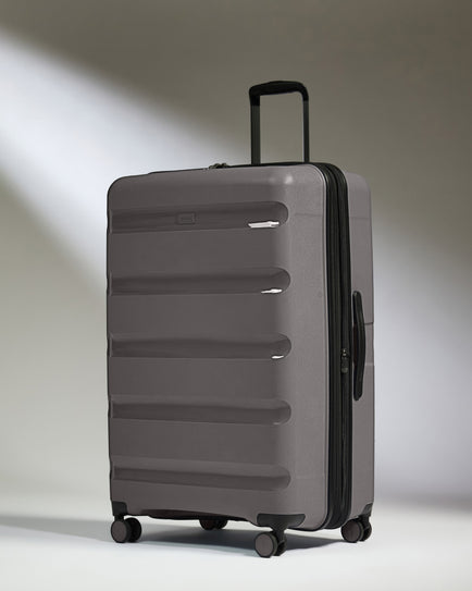 Large Suitcase in Gloss Gull Grey - Logo Stripe