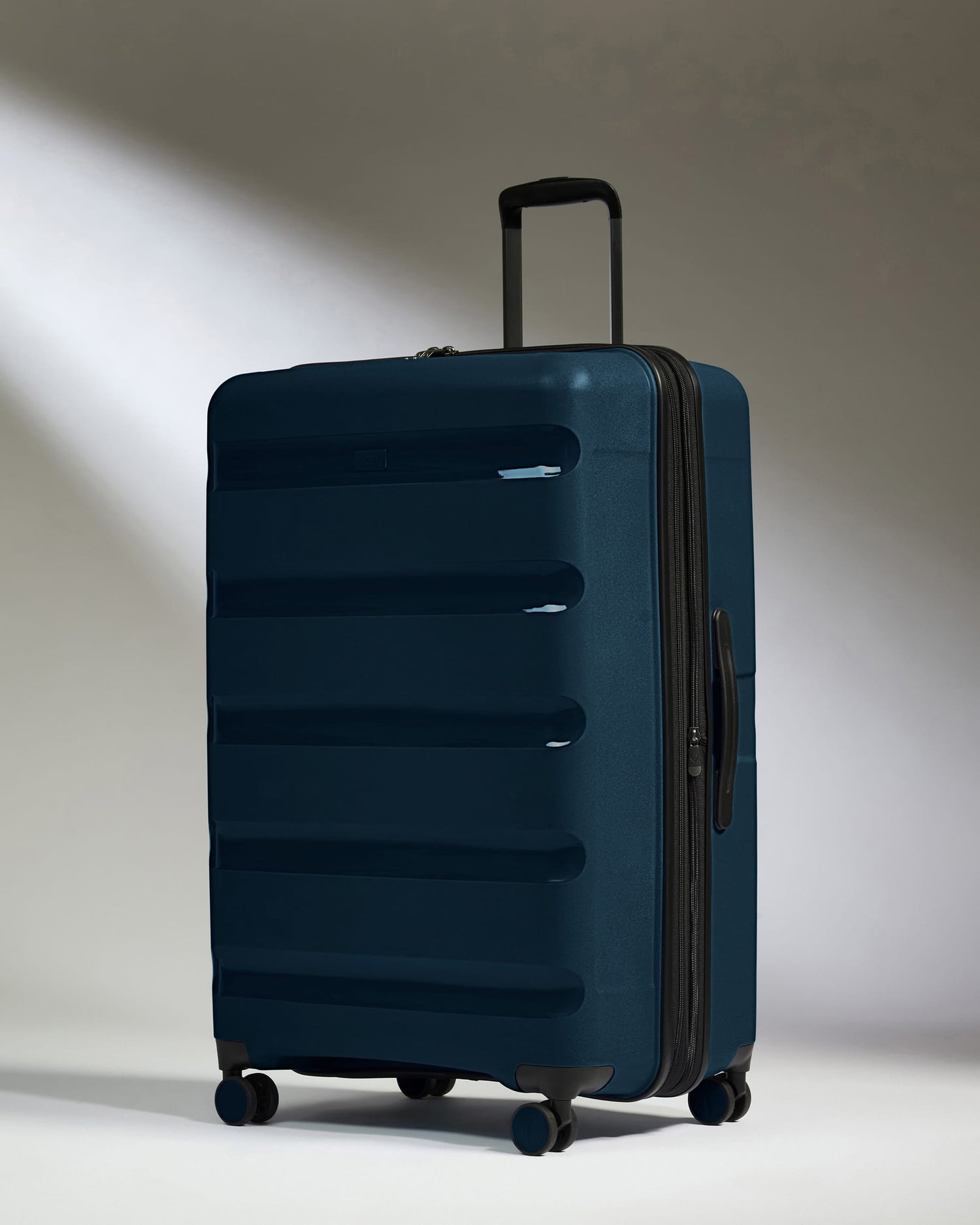 Large Suitcase in Midnight Blue - Logo Stripe