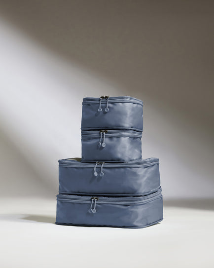 a stack of blue bags